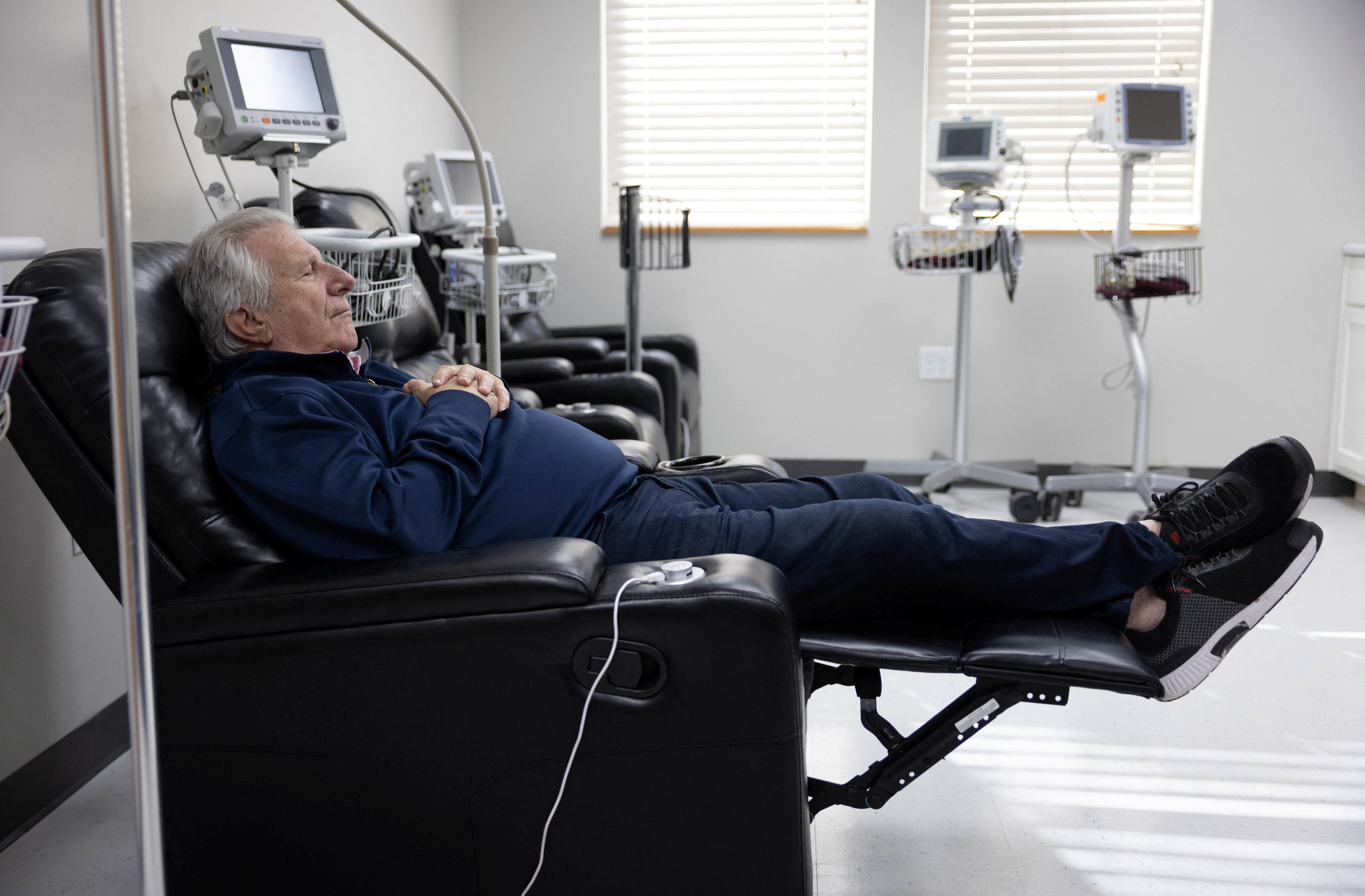 Braid, 78, takes a nap in the newly set-up recovery room at Alamo Women's Clinic in Carbondale, Illinois