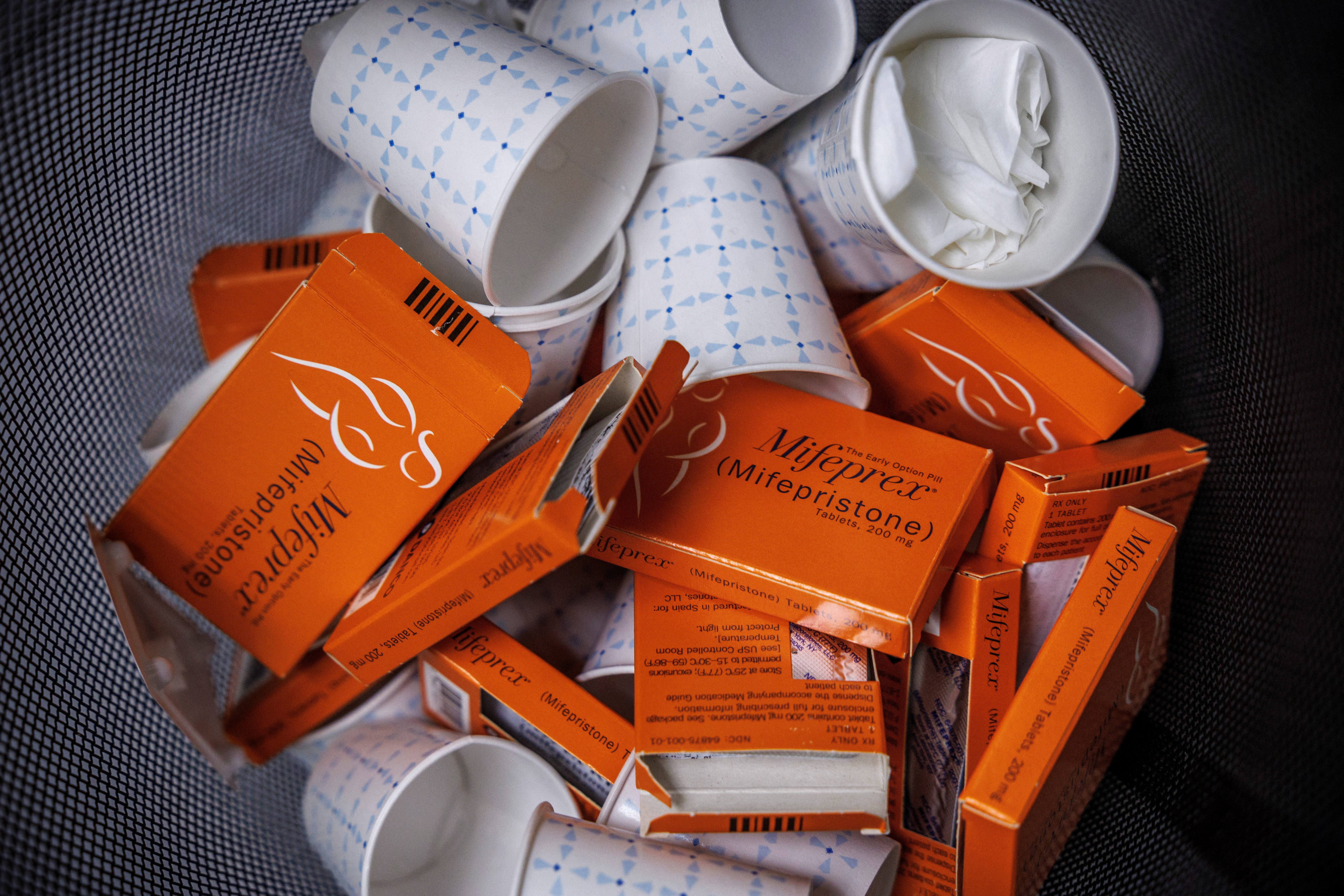 Empty boxes of Mifepristone pills, the first drug used in a medication abortion, fill a bin at Alamo Women's Clinic in Albuquerque, New Mexico