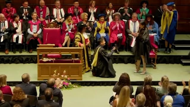 <p>Student proposes to shocked girlfriend in middle of her graduation ceremony.</p>