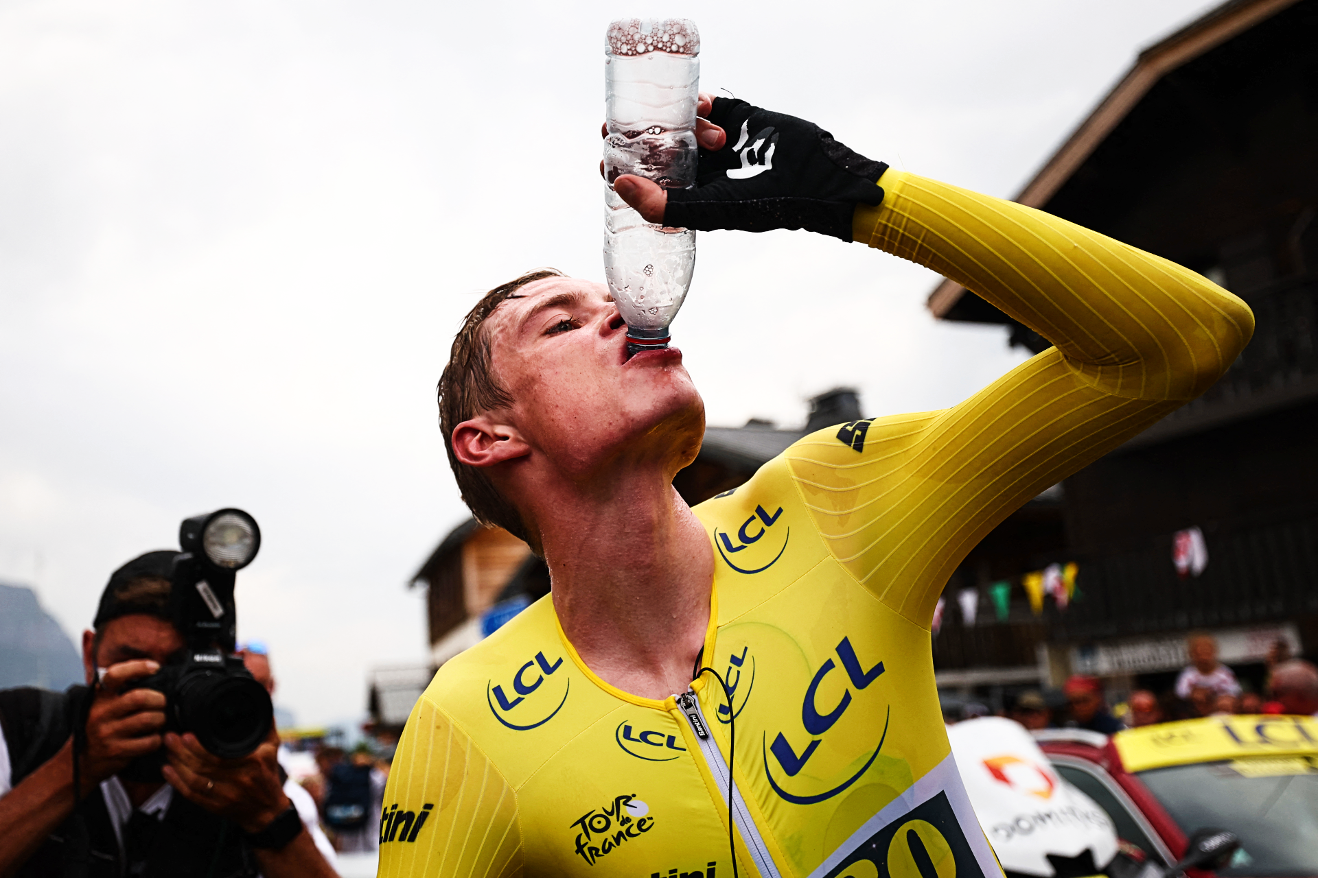 Jonas Vingegaard downs some water after winning Tuesday’s stage 16 time trial