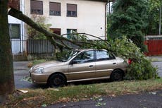 A child and a woman die in Serbia as a second deadly storm rips through the Balkans this week