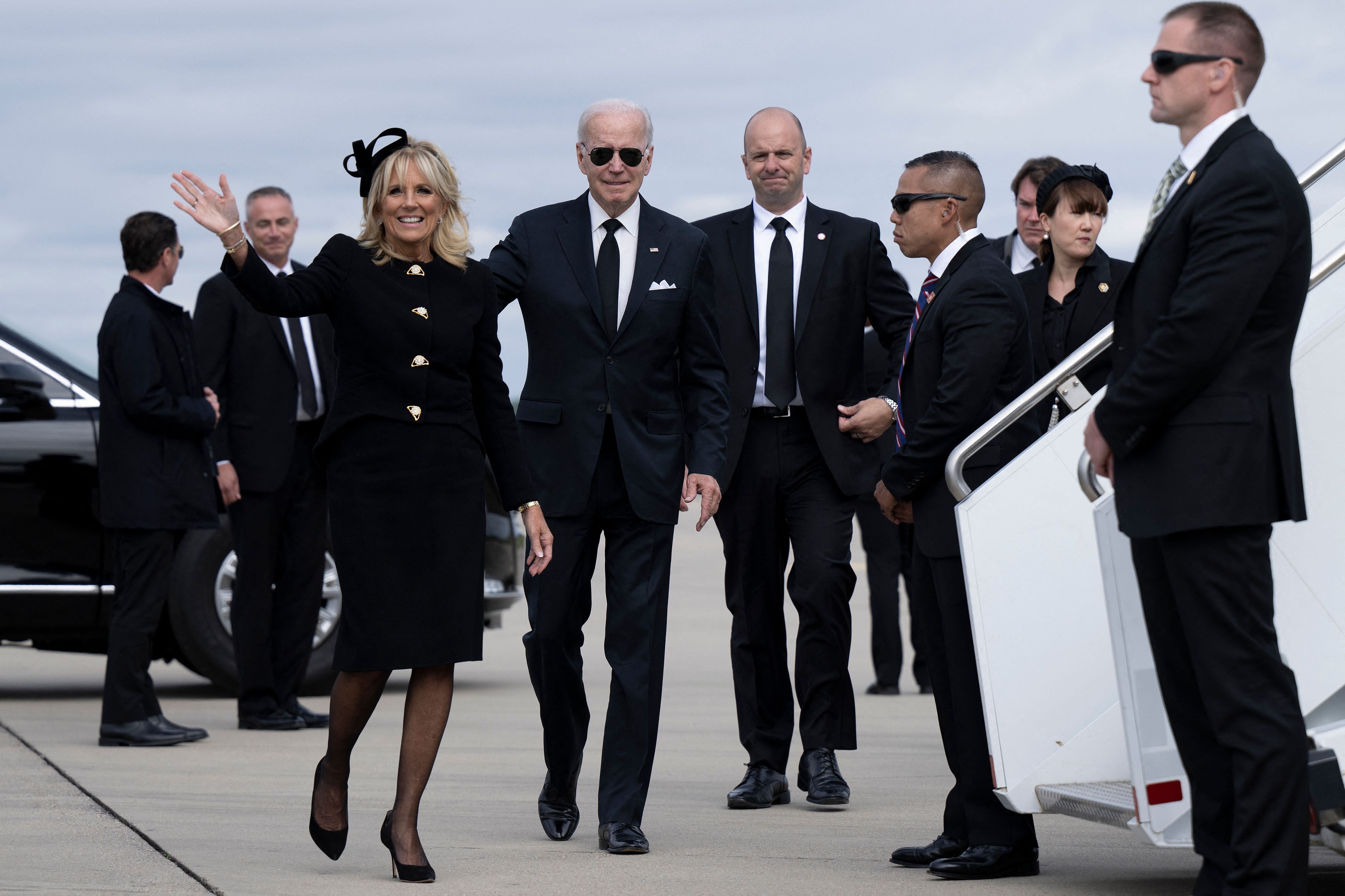 First Lady Jill Biden and President Joe Biden walk to board Air Force One at London Stansted Airport in Stansted, United Kingdom, on September 19, 2022