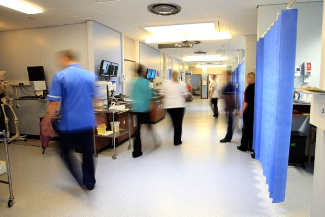 Thousands of NHS consultants are on a 48-hour strike in a dispute with the Government over pay (Peter Byrne/PA)