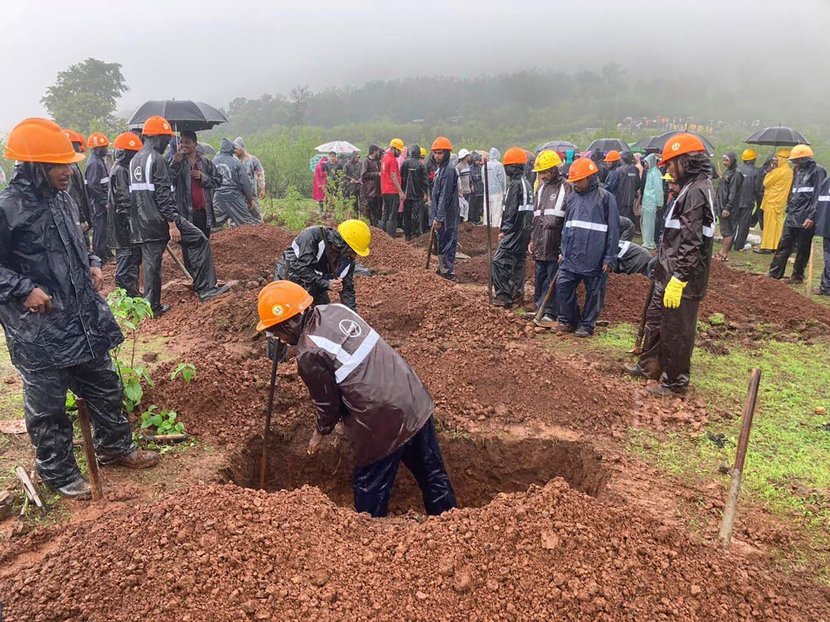 Landslide triggered by heavy rains kills 10 and traps many others in western India