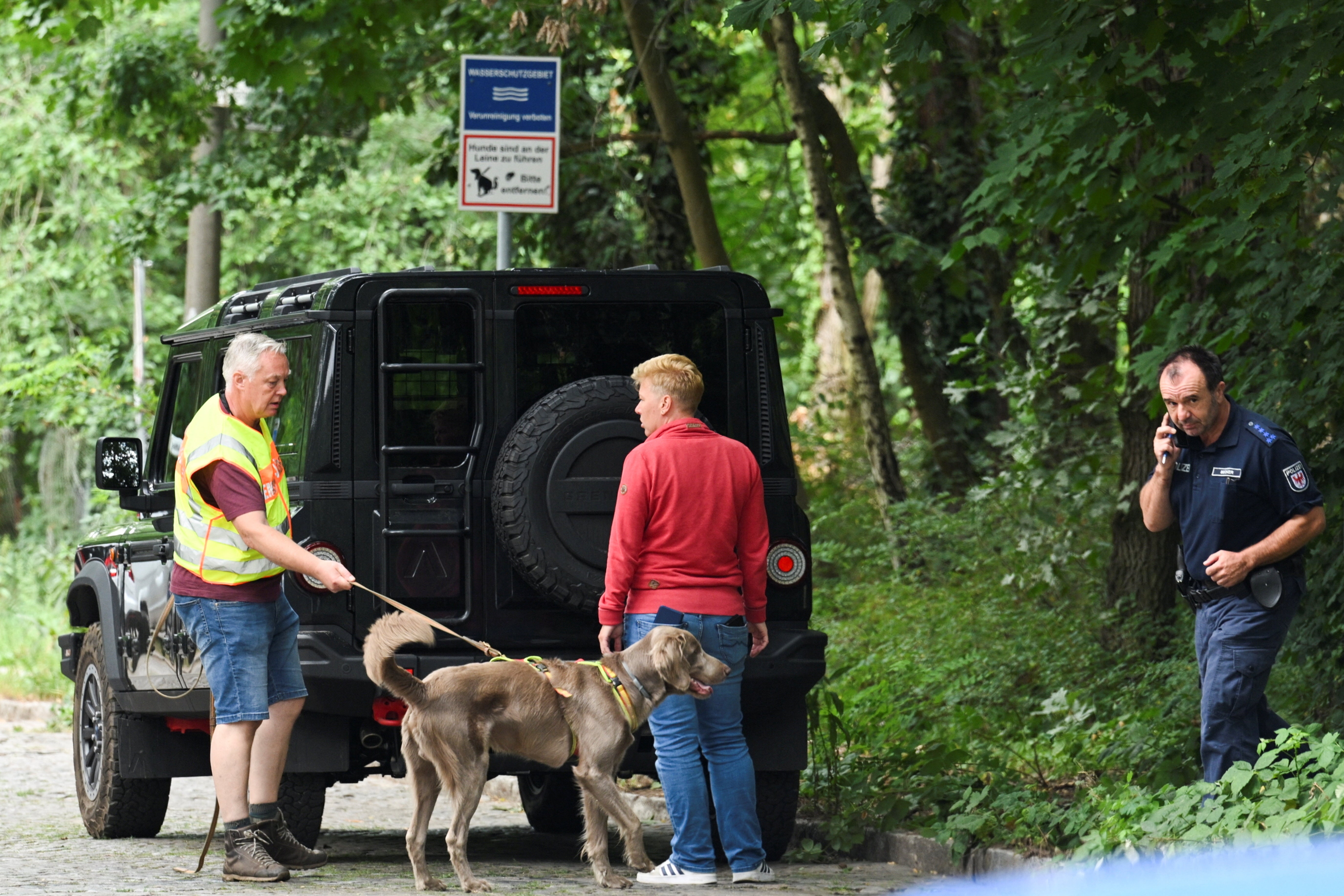 A sniffer dog is brought in for the search