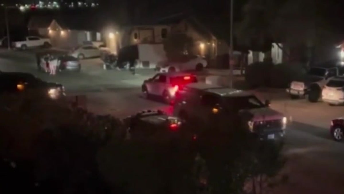 Moment police swarm Las Vegas house 27 years after Tupac murdered in drive-by shooting