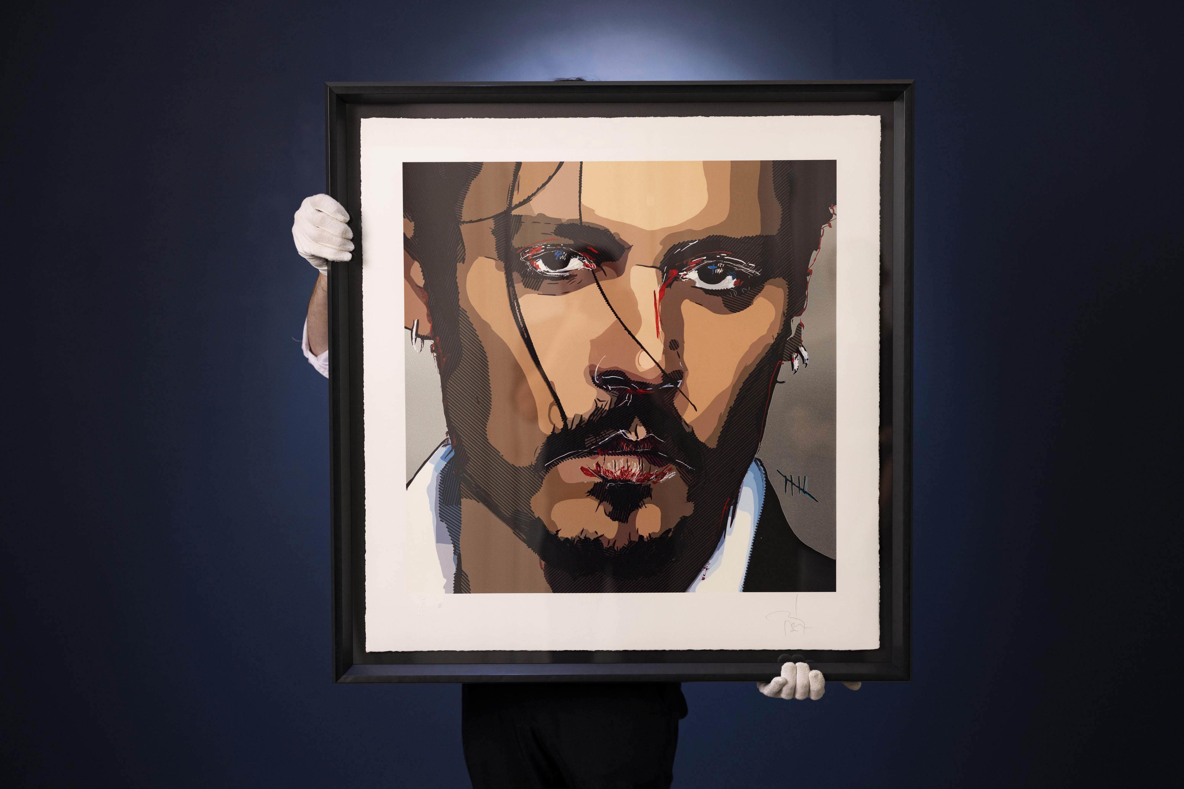 A self-portrait by Johnny Depp titled Five is unveiled at Castle Fine Art in London ahead of prints being made available to buy (David Parry/PA)