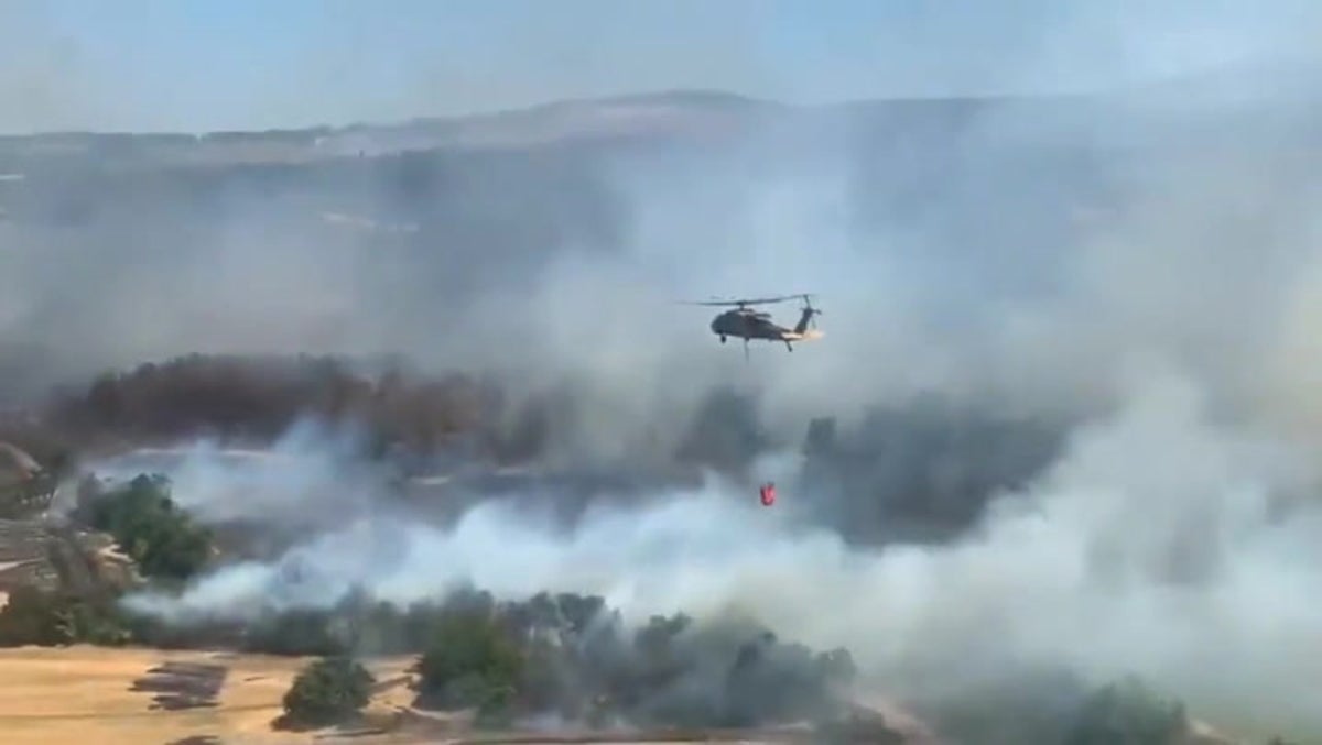 Helicopters battle wildfires fuelled by strong winds in Turkey | News