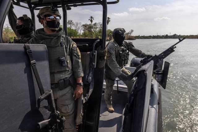 <p>Members of the Texas Department of Public Safety's Tactical Marine Unit patrol the Rio Grande along the U.S.-Mexico Border on March 23, 2021 near Mission, Texas, as part of Operation Lone Star. </p>