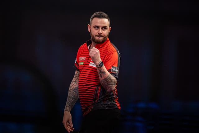 Joe Cullen secured his place in the World Matchplay semi-finals with victory over Daryl Gurney (Steven Paston/PA)