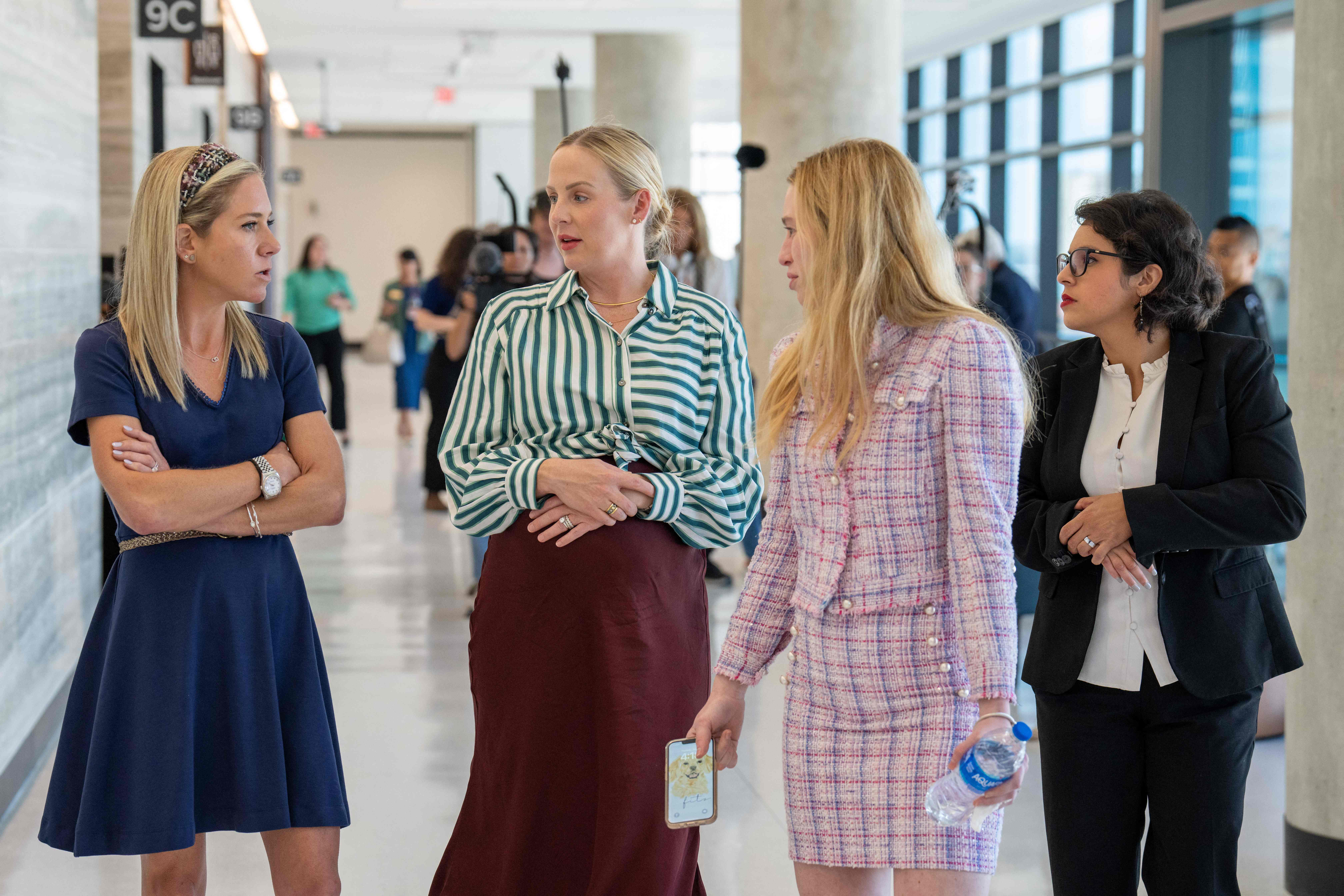 Plaintiffs Amanda Zurawski, Austin Dennard, Taylor Edwards and Elizabeth Waller appear inside a Texas courthouse on 20 July during hearings in their lawsuit against the state’s anti-abortion law