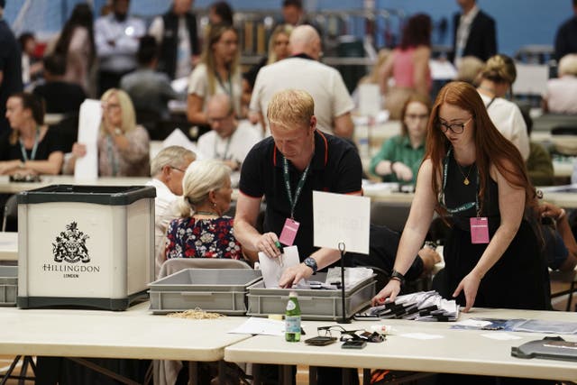 Ballots are counted at Queensmead Sports Centre in South Ruislip (Jordan Pettitt/PA)