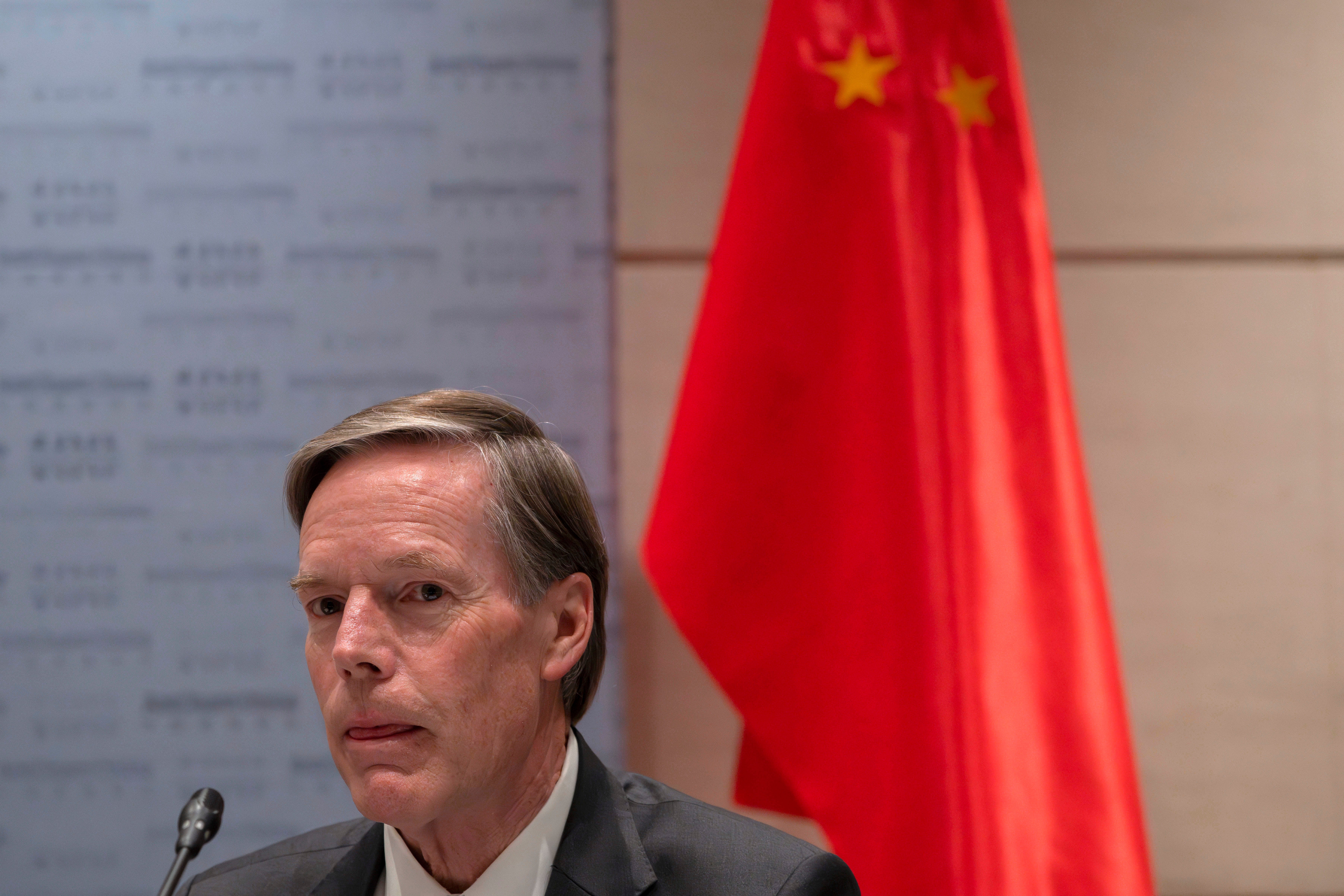 US Ambassador to China, Nicholas Burns listens to a speaker during a roundtable meeting with members of the American business community in Beijing