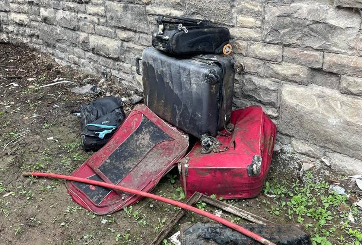 Sewage floods because of four dumped suitcases