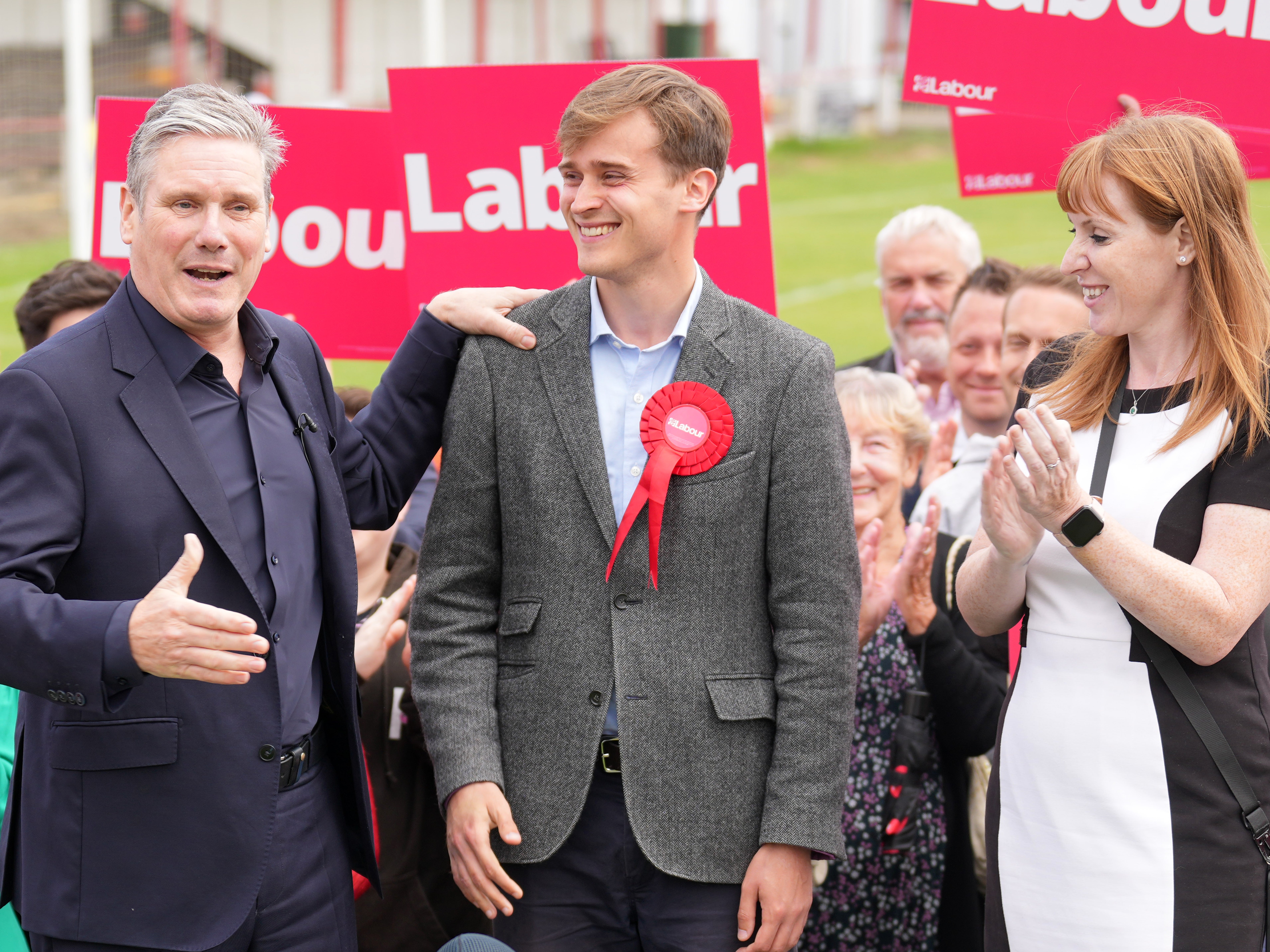 New MP Keir Mather (centre), with Keir Starmer and Angela Rayner