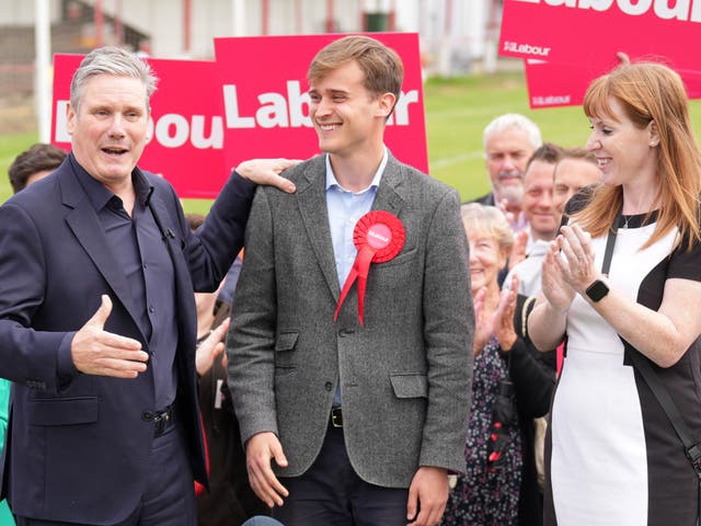 <p>New MP Keir Mather (centre), with Keir Starmer and  Angela Rayner </p>