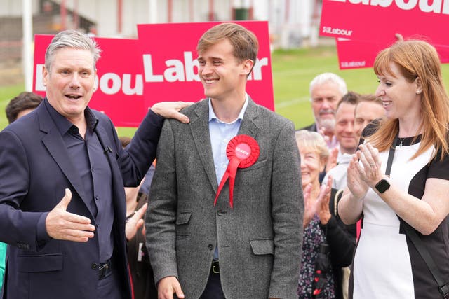 <p>New MP Keir Mather (centre), with Keir Starmer and  Angela Rayner </p>