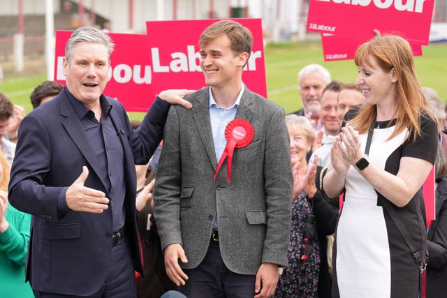 Sir Keir Starmer, left, and Angela Rayner celebrate with Keir Mather in Selby (Danny Lawson/PA)