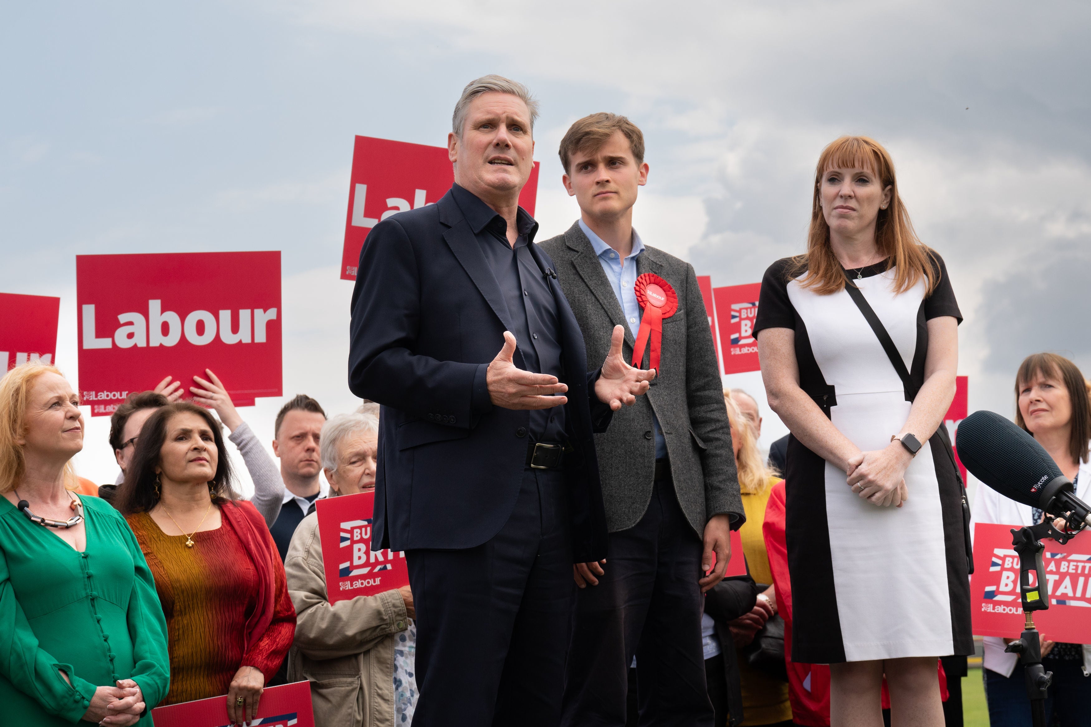 Newly elected Labour MP Keir Mather (centre) with Labour leader Sir Keir Starmer at Selby football club, North Yorkshire, after winning the Selby and Ainsty by-election