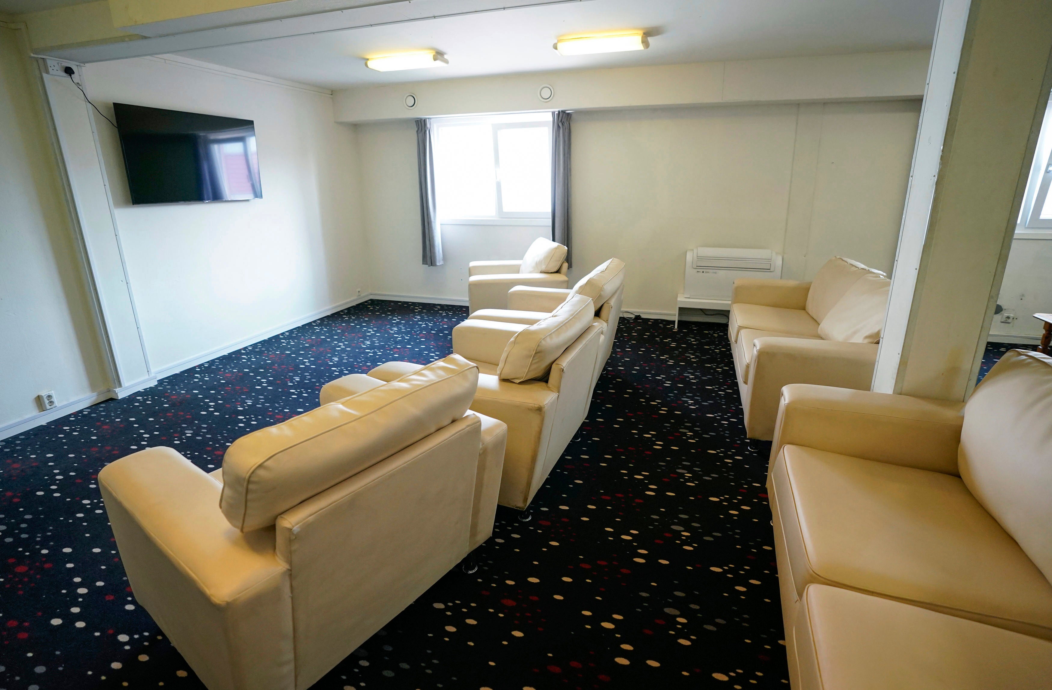 A room for residents to watch television onboard the Bibby Stockholm accommodation barge
