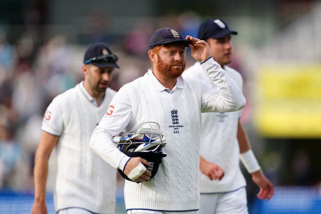 Mark Wood (left) and Jonny Bairstow (centre) starred as England pressed home their advantage (PA)