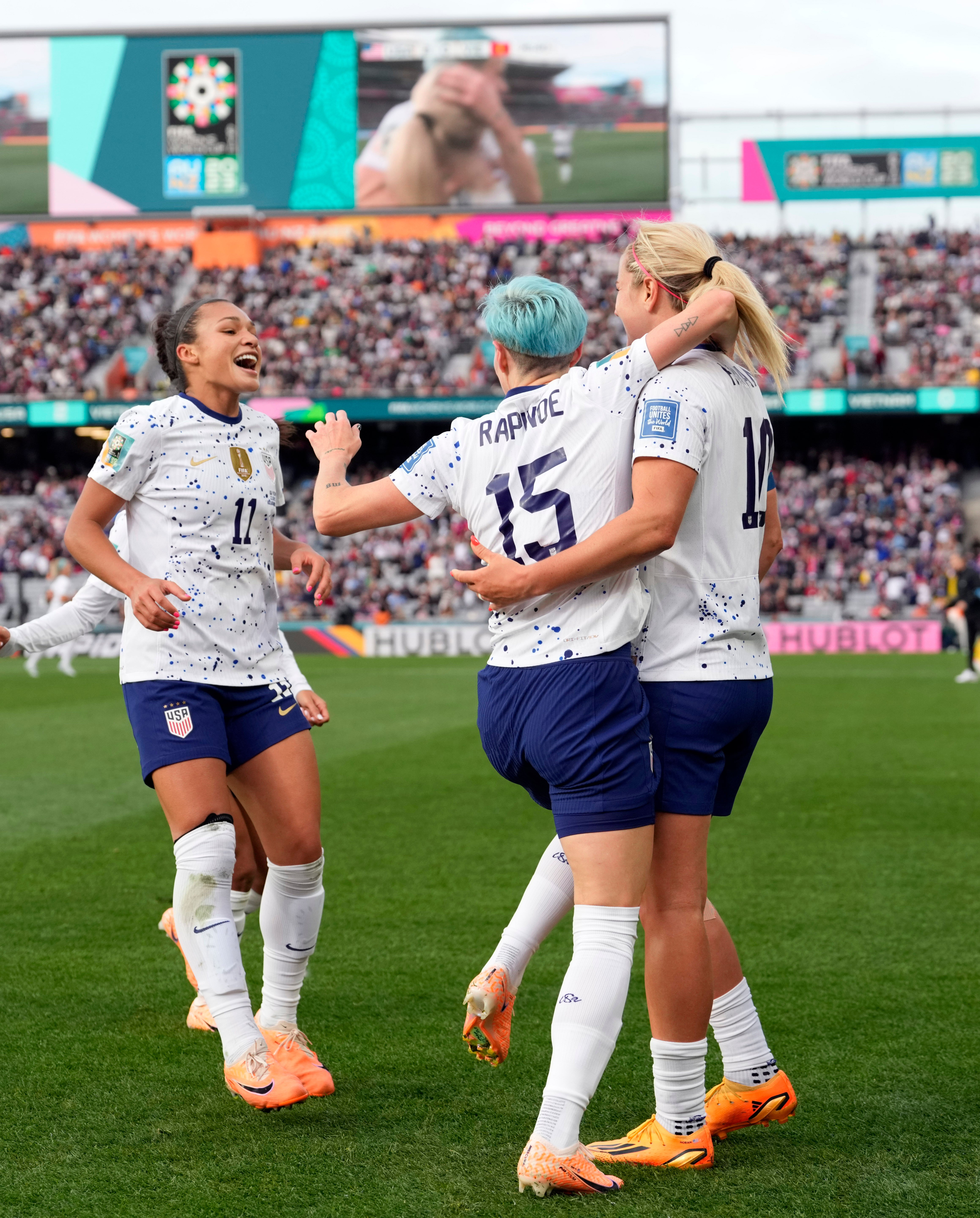 Sophia Smith joins Megan Rapinoe and Lindsey Horan for a celebration after the USA’s third goal against Vietnam on July 21, 2023