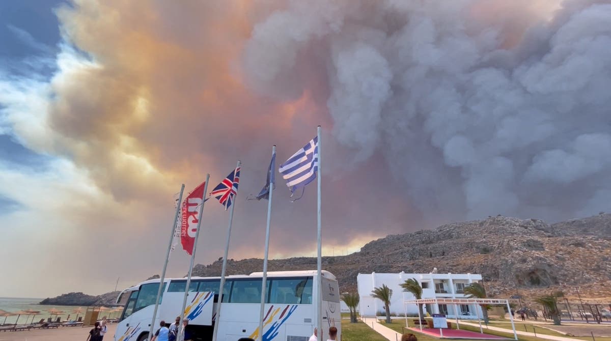 Wildfires on Greek island of Rhodes force hundreds of holidaymakers to evacuate Wildfires on Greek island of Rhodes force hundreds of holidaymakers to evacuate