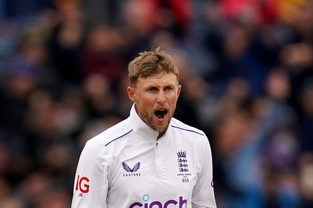England’s Joe Root celebrates taking the wicket of Australia’s Marnus Labuschagne (Martin Rickett/PA)