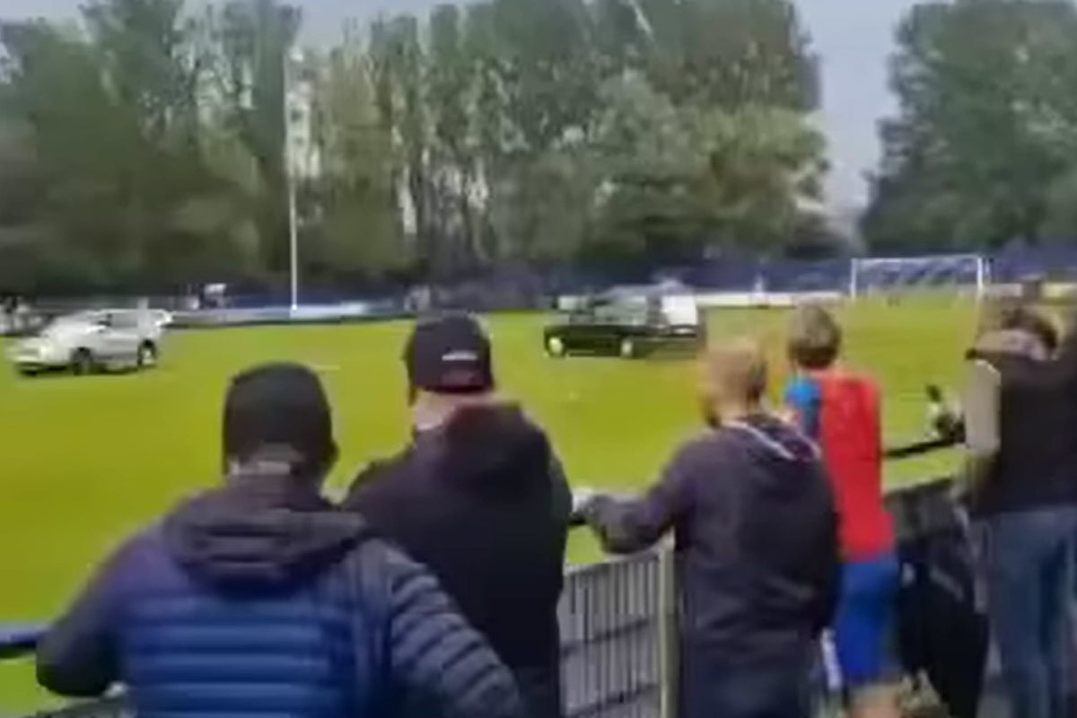 Four men arrested after hearse on pitch forces football match to be abandoned