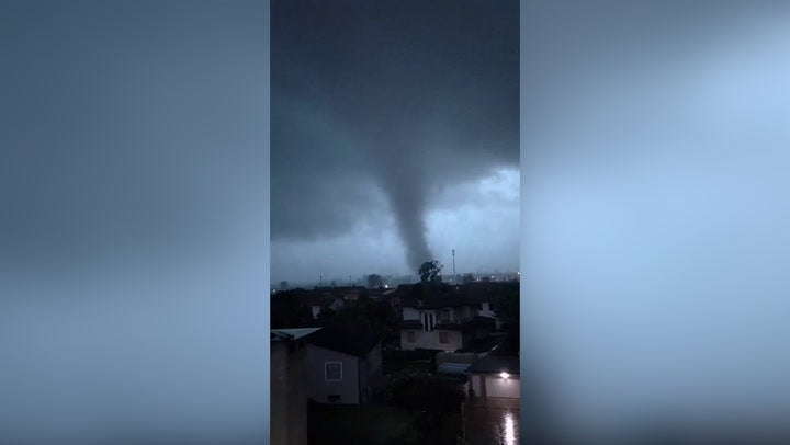 An overnight storm in Milan tore off roofs and uprooted trees