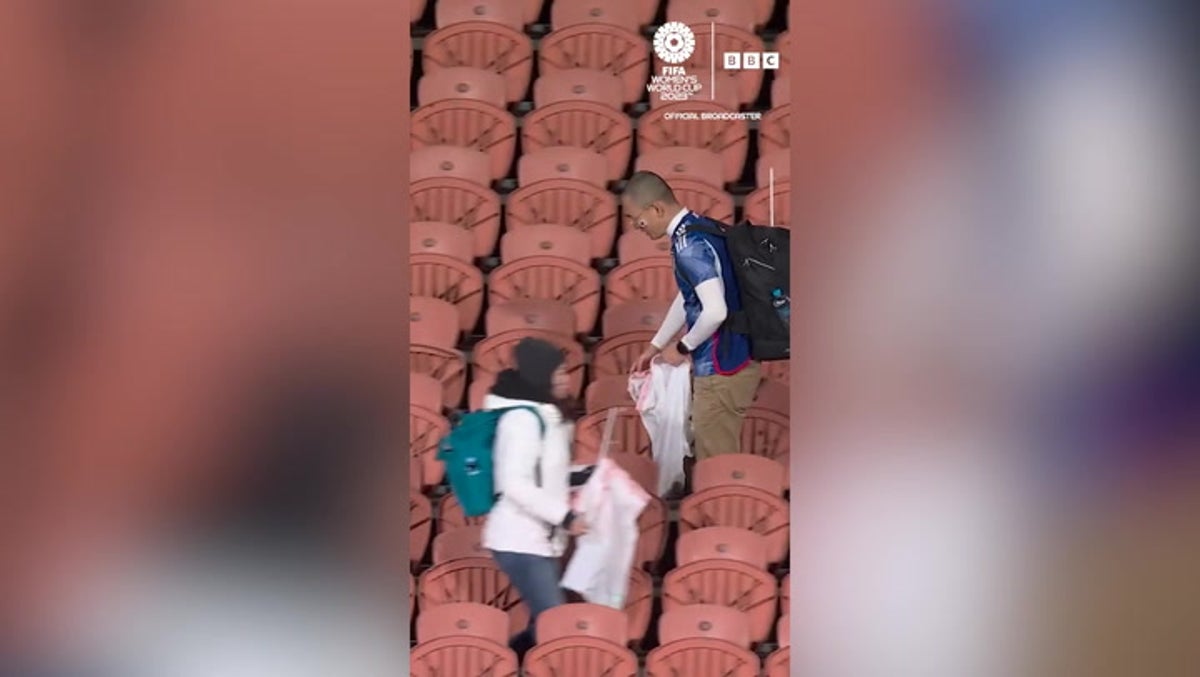 Japan fans stay behind after Women’s World Cup match to clean stands