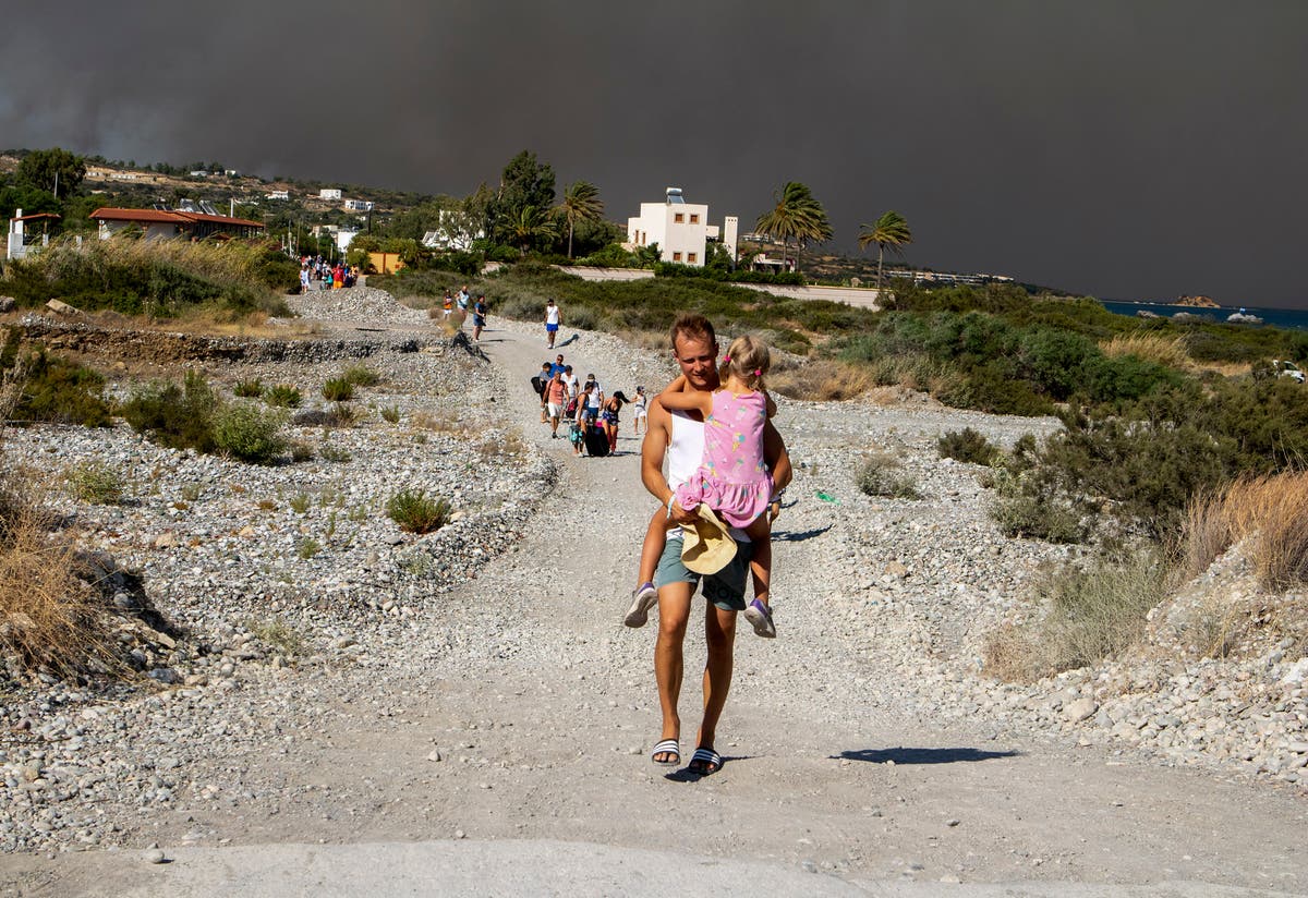 Greek authorities evacuate some 19,000 people as wildfire blazes on the Greek island of Rhodes Greek authorities evacuate some 19,000 people as wildfire blazes on the Greek island of Rhodes