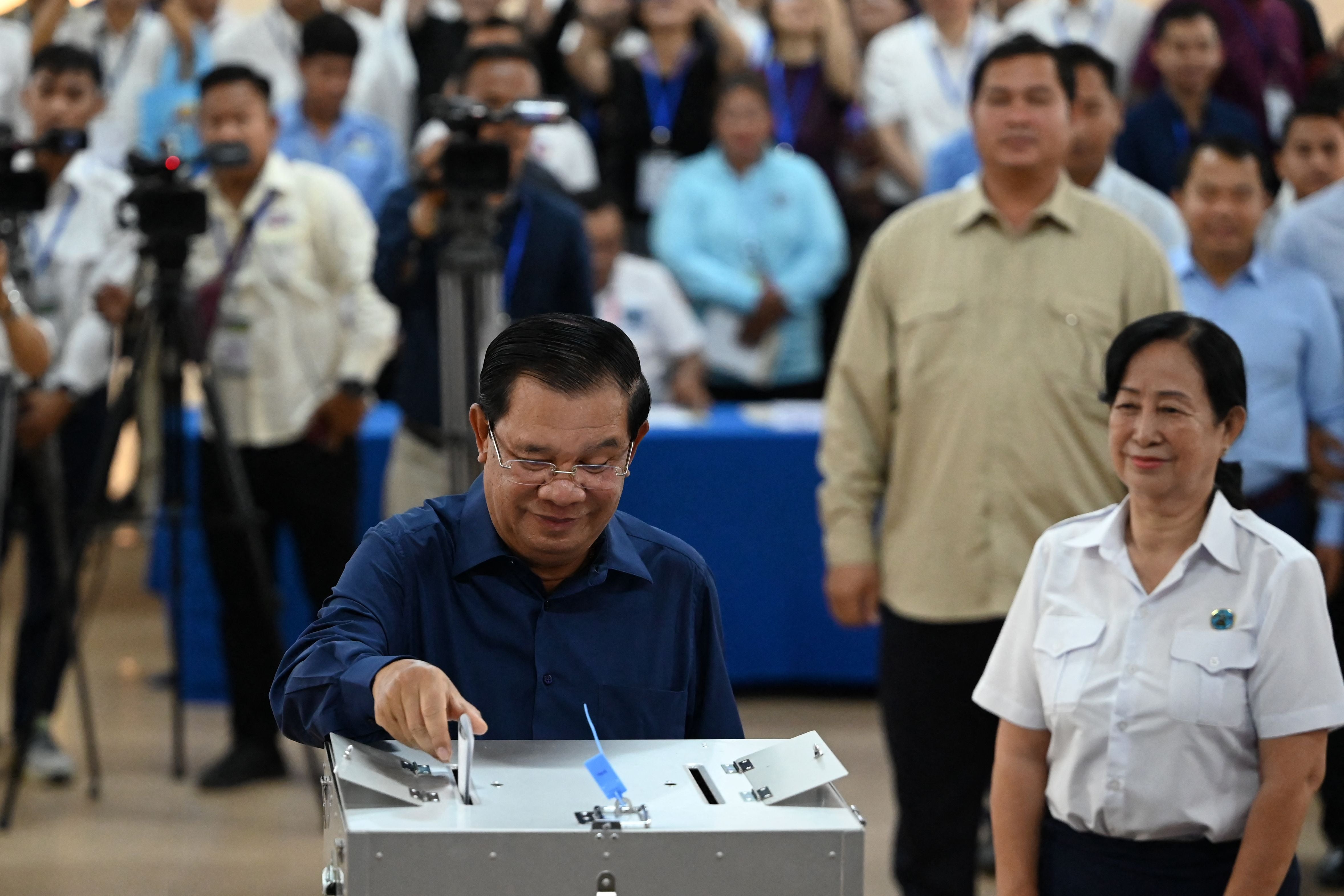 Cambodia’s Prime Minister Hun Sen casts his vote at a polling station in Kandal province on 23 July, 2023 during the general elections