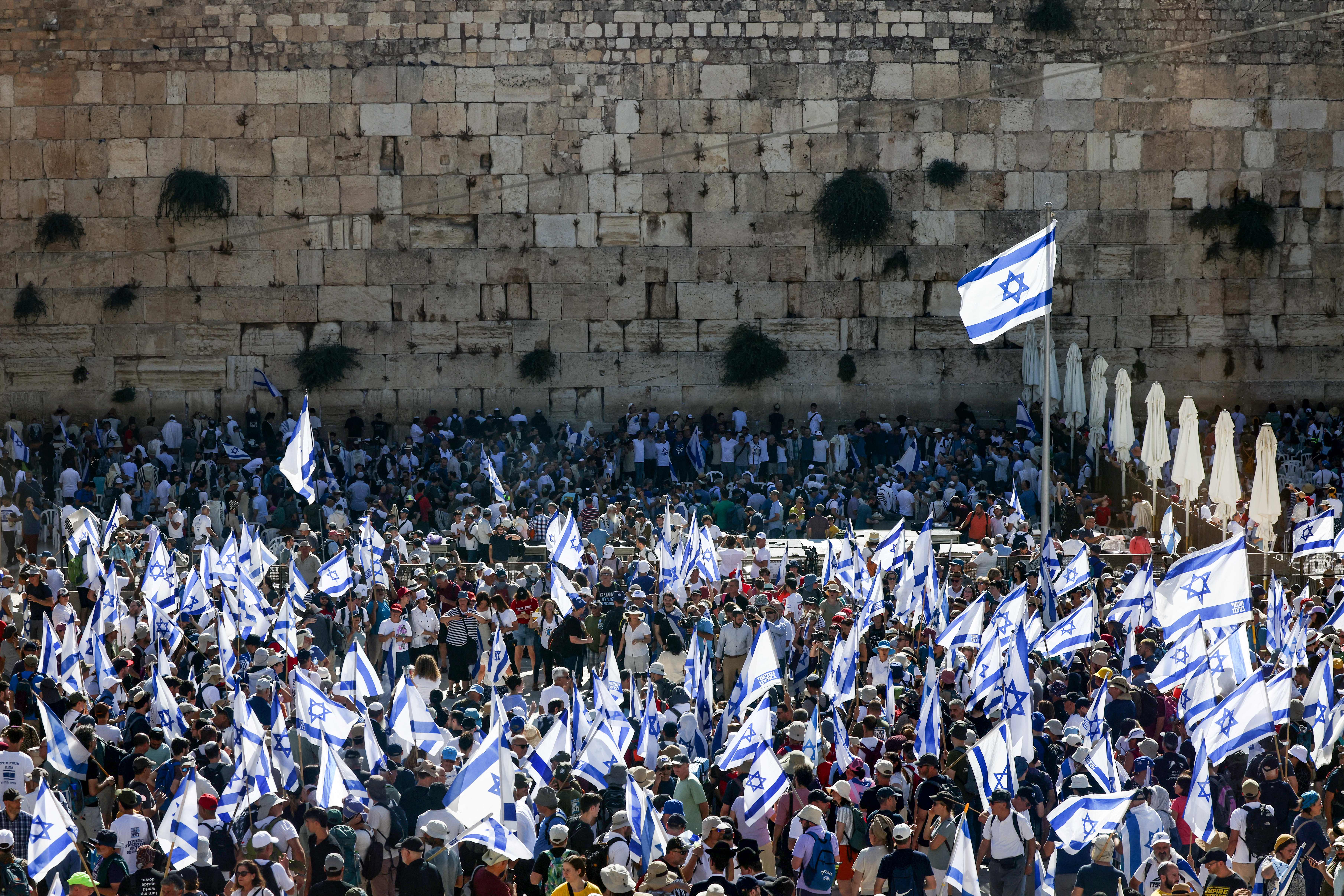 Protesters against the Israeli government’s judicial overhaul bill gather at the Western Wall in Jerusalem for a mass unity prayer on July 23, 2023, ahead of a vote in the parliament