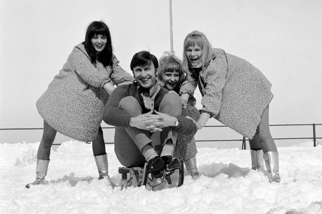 Singer Vince Hill in 1967, when his recording of Edelweiss was high in the charts, enjoying a holiday in the mountains of Switzerland. He is pictured with members of pop group The Dollies (PA)