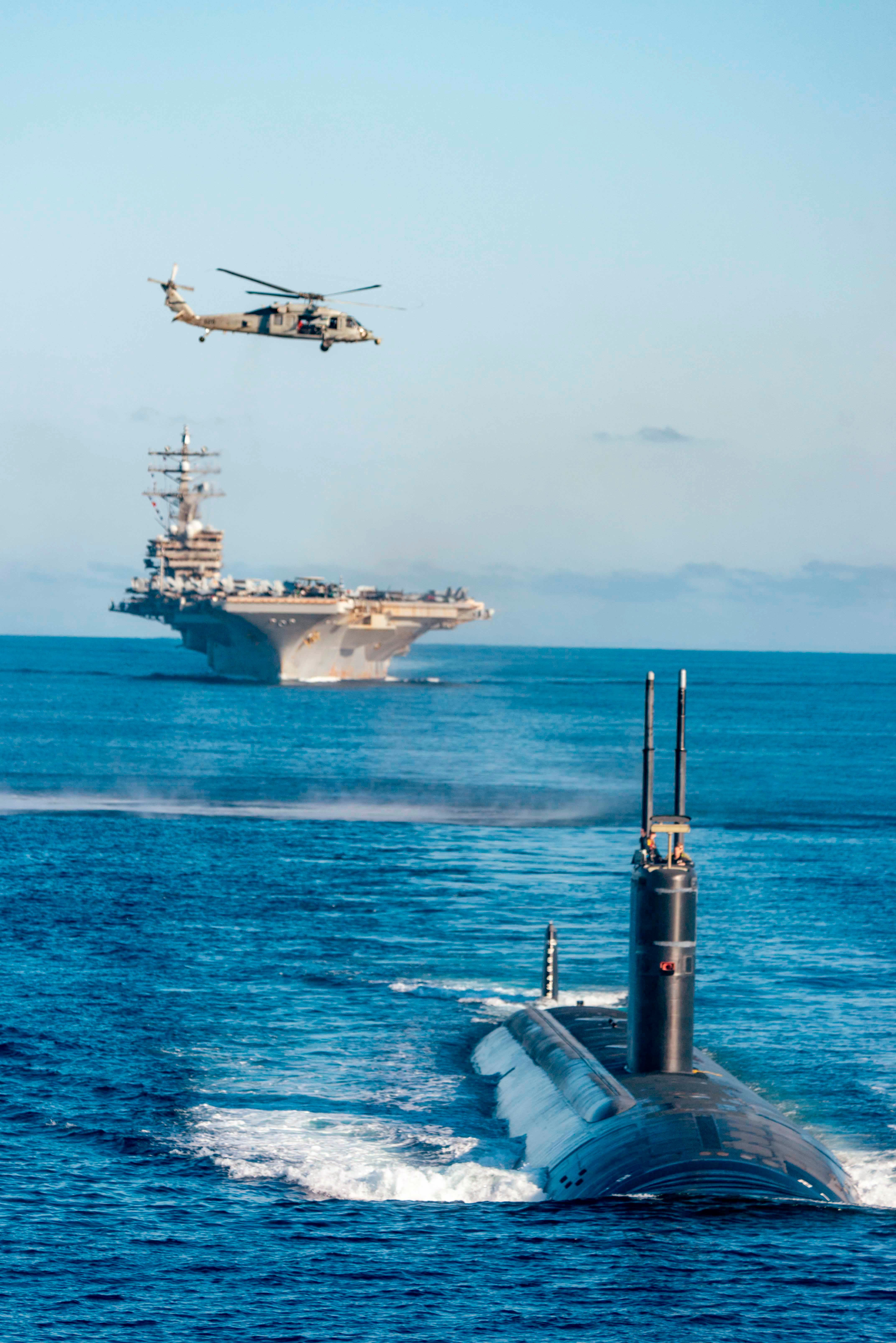 The USS ‘Ronald Reagan’ aircraft carrier and the nuclear-powered submarine USS ‘Annapolis’ participate in a joint anti-submarine drill between South Korea, the United States and Japan in waters off South Korea last year