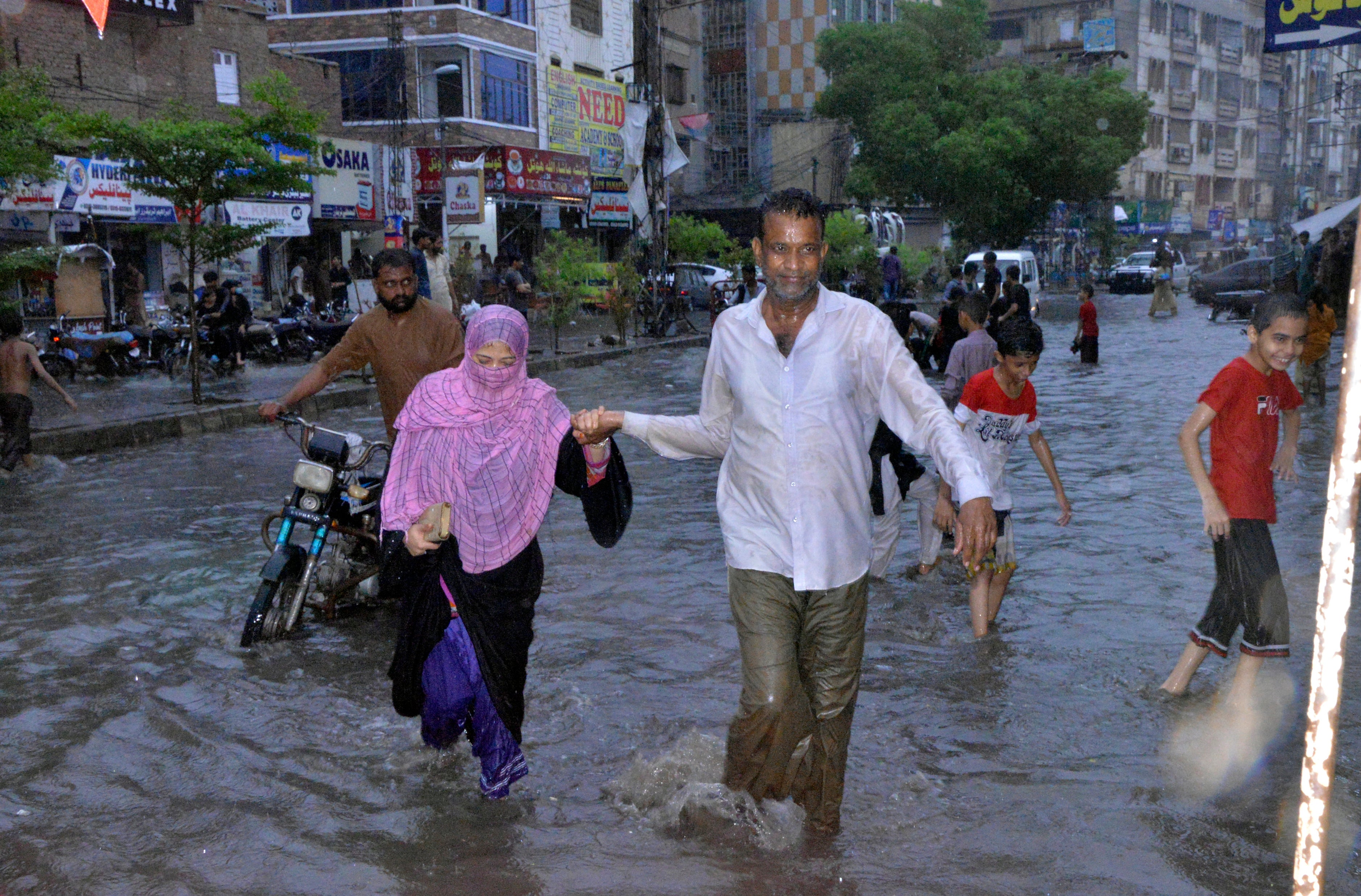 CORRECTION Pakistan Monsoon Rains