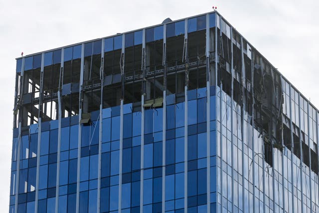 <p>Damage to the upper floors of a Moscow building is seen after a reported drone attack on Monday morning </p>