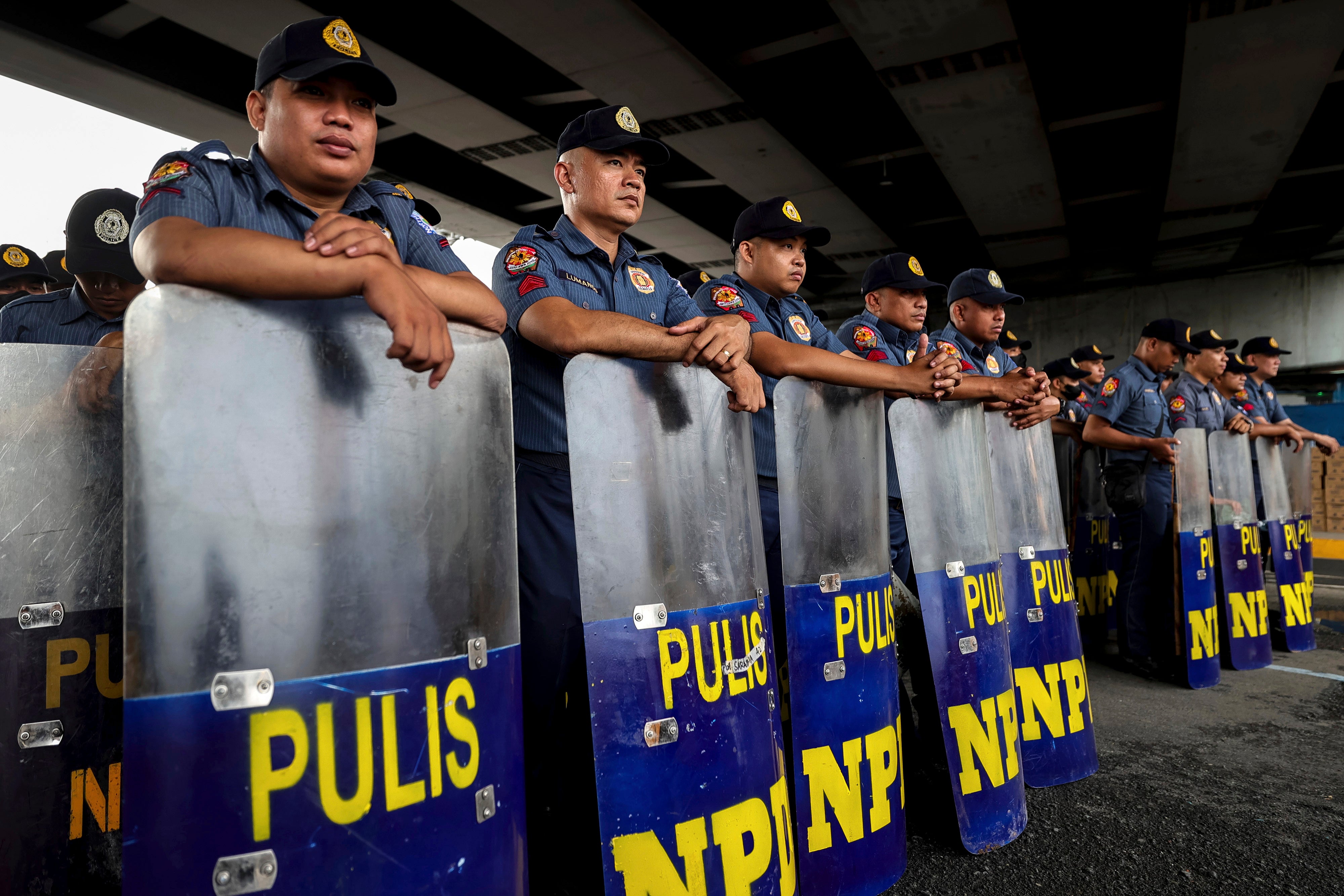 Representational image of police personnel in the Philippines standing in formation with shields in Quezon city in 24 July 2023