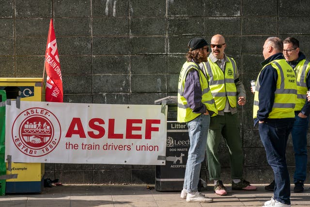<p>Members of the Aslef union on a picket line near to Leeds railway station</p>