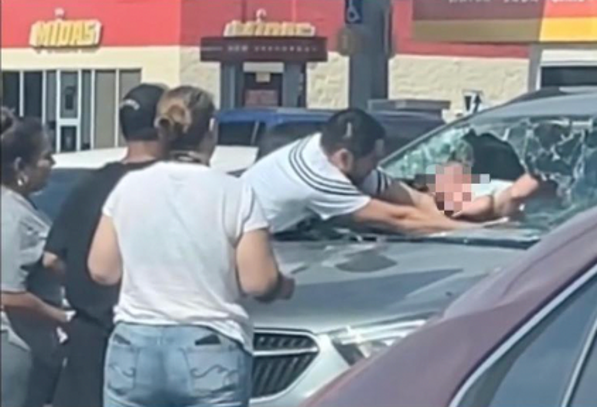 Video captures father smashing windshield to rescue baby from hot car