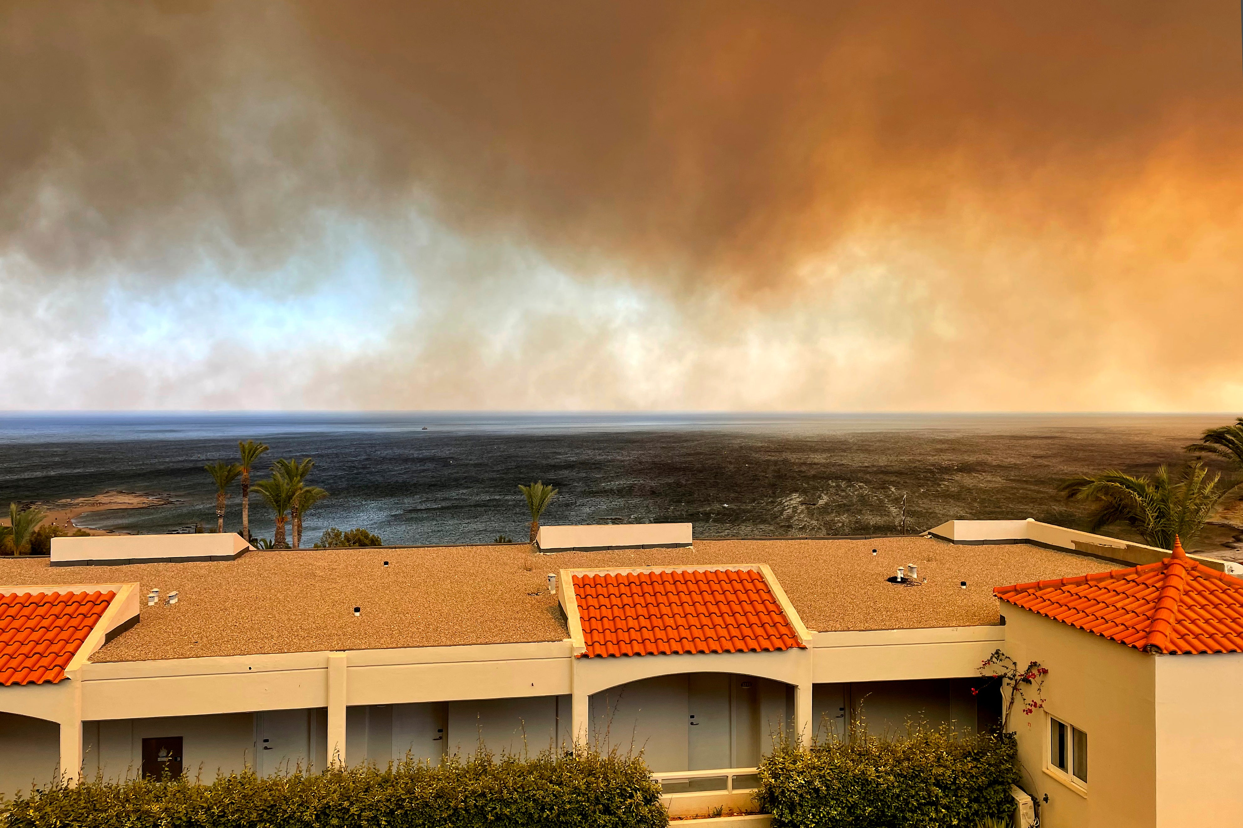 Smoke is seen from the Rodos Princess Beach Hotel on the Aegean Sea Island of Rhodes