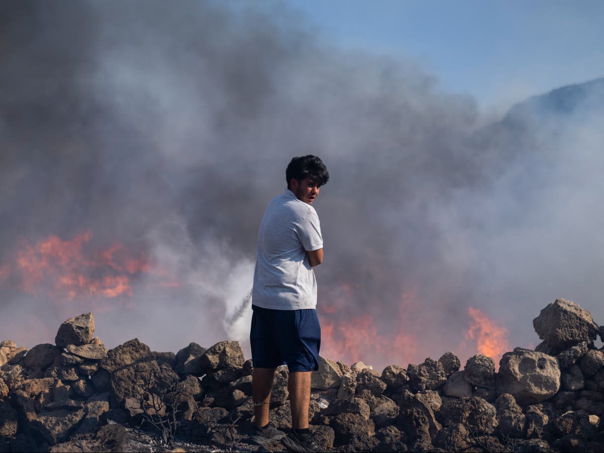 UK rescue flights for tourists fleeing &lsquo;out of control&rsquo; wildfires in Rhodes and Corfu