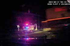 Colorado officer on trial for putting suspect in car hit by train says she didn’t know vehicle was approaching