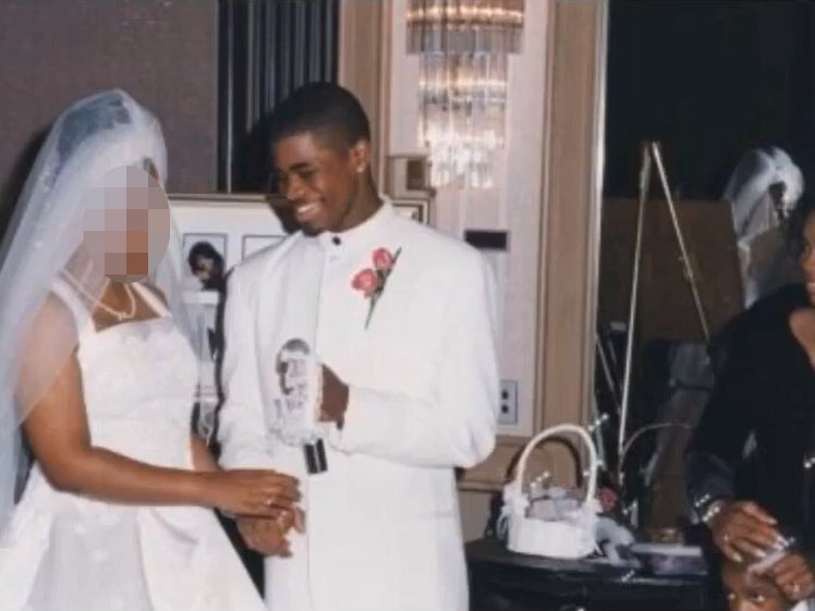 Tafari Campbell marries his wife in 1999. Her face has been blurred out of respect for her identity.