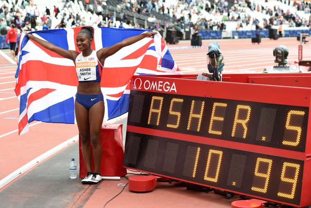 Dina Asher-Smith celebrates becoming the first British woman to run the 100m in under 11 seconds (Martin Rickett/PA)