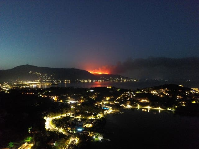 <p>Plumes of smoke rise from a wildfire on the island of Corfu, Greece</p>