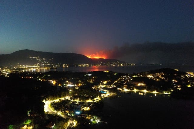 <p>Plumes of smoke rise from a wildfire on the island of Corfu, Greece</p>