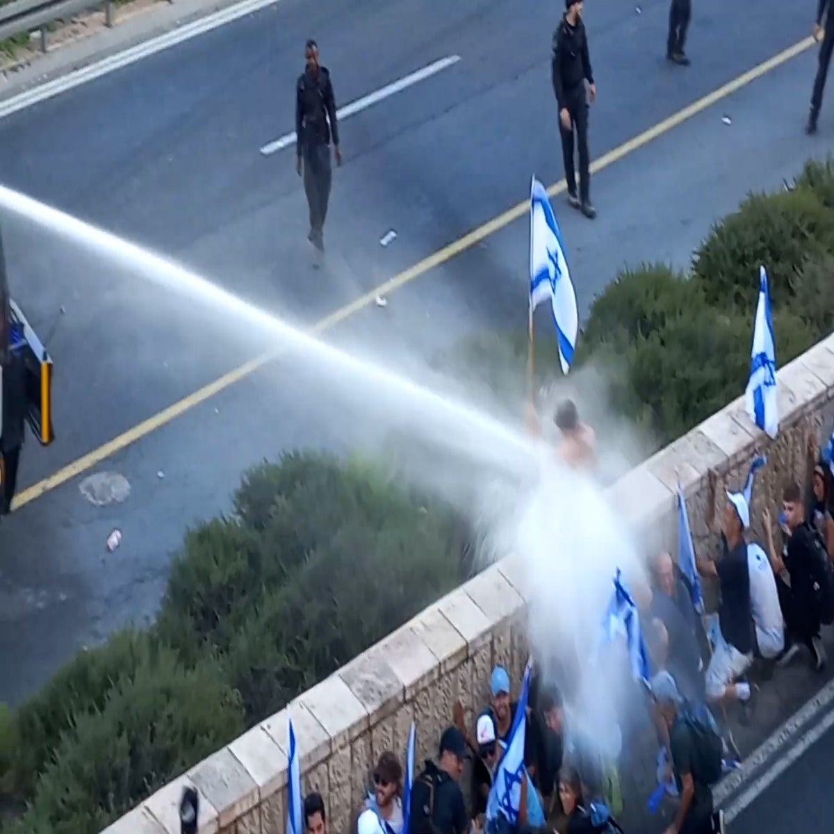 Israeli police fire water cannon at crowd protesting judicial overhaul |  News | Independent TV