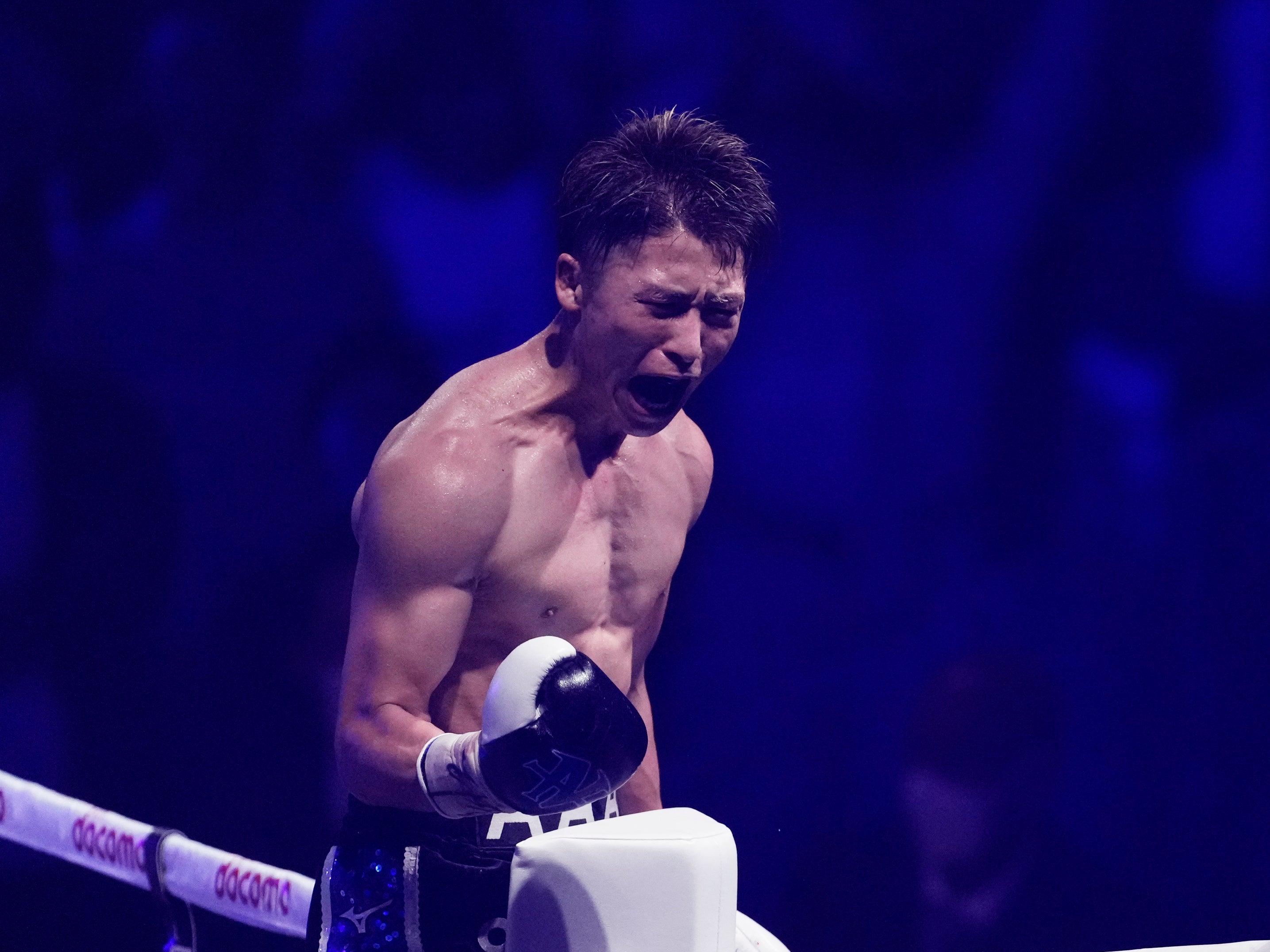 Naoya Inoue celebrates stopping Stephen Fulton to take his super-bantamweight belts